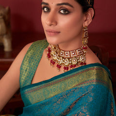 Ravishing Rama Kanjivaram Silk Saree With Flameboyant Blouse Piece