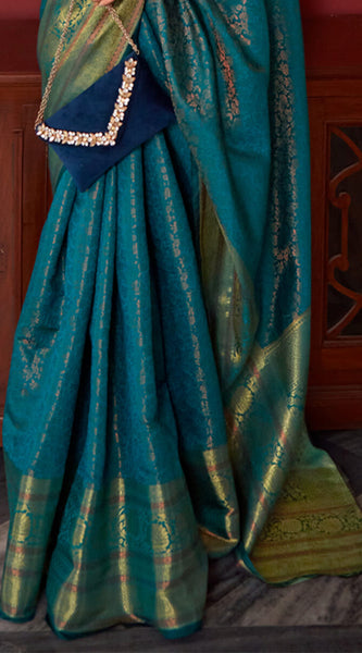 Ravishing Rama Kanjivaram Silk Saree With Flameboyant Blouse Piece