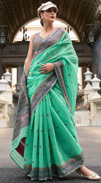 Cynosure Sea Green Cotton Silk Saree With Mellifluous Blouse Piece