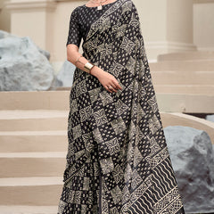 Cynosure Black Printed Mul Cotton Saree With Beleaguer Blouse Piece