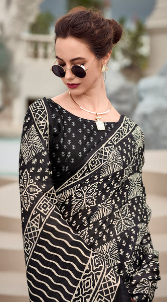 Cynosure Black Printed Mul Cotton Saree With Beleaguer Blouse Piece