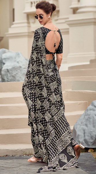 Cynosure Black Printed Mul Cotton Saree With Beleaguer Blouse Piece