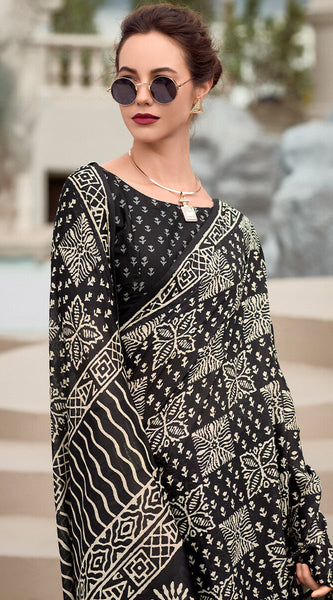Cynosure Black Printed Mul Cotton Saree With Beleaguer Blouse Piece