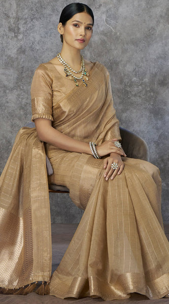 Cynosure Beige Cotton Silk Saree With Tantalizing Blouse Piece