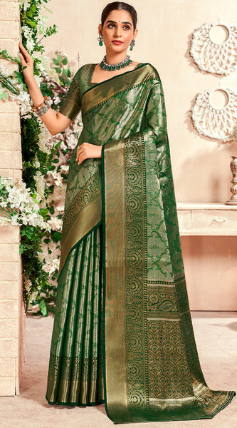 Desiring Dark Green Kanjivaram Silk Saree With Ravishing Blouse Piece