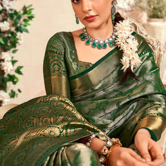 Desiring Dark Green Kanjivaram Silk Saree With Ravishing Blouse Piece
