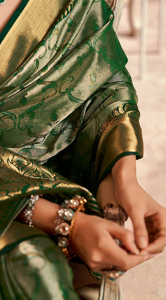 Desiring Dark Green Kanjivaram Silk Saree With Ravishing Blouse Piece