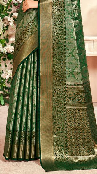 Desiring Dark Green Kanjivaram Silk Saree With Ravishing Blouse Piece