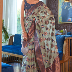 Splendorous Sea Green Organza Silk Saree With Glittering Blouse Piece