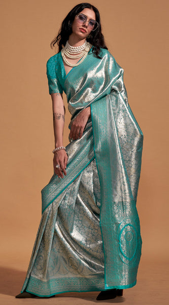 Demure Sea Green Kanjivaram Silk Saree With Ornate Blouse Piece