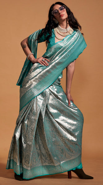 Demure Sea Green Kanjivaram Silk Saree With Ornate Blouse Piece