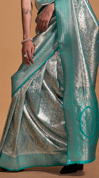 Demure Sea Green Kanjivaram Silk Saree With Ornate Blouse Piece