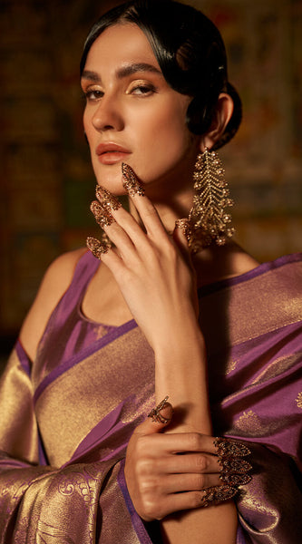 Innovative Purple Kanjivaram Silk Saree With Gleaming Blouse Piece
