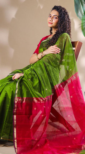 Opulent Green Cotton Silk Saree With Demanding Blouse Piece