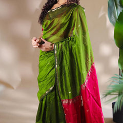 Opulent Green Cotton Silk Saree With Demanding Blouse Piece