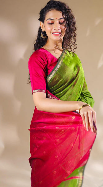 Opulent Green Cotton Silk Saree With Demanding Blouse Piece
