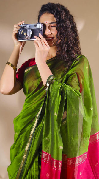 Opulent Green Cotton Silk Saree With Demanding Blouse Piece