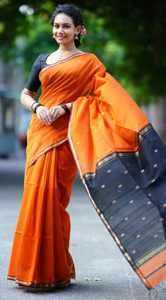 Enigmatic Orange Cotton Silk Saree With Panache Blouse Piece