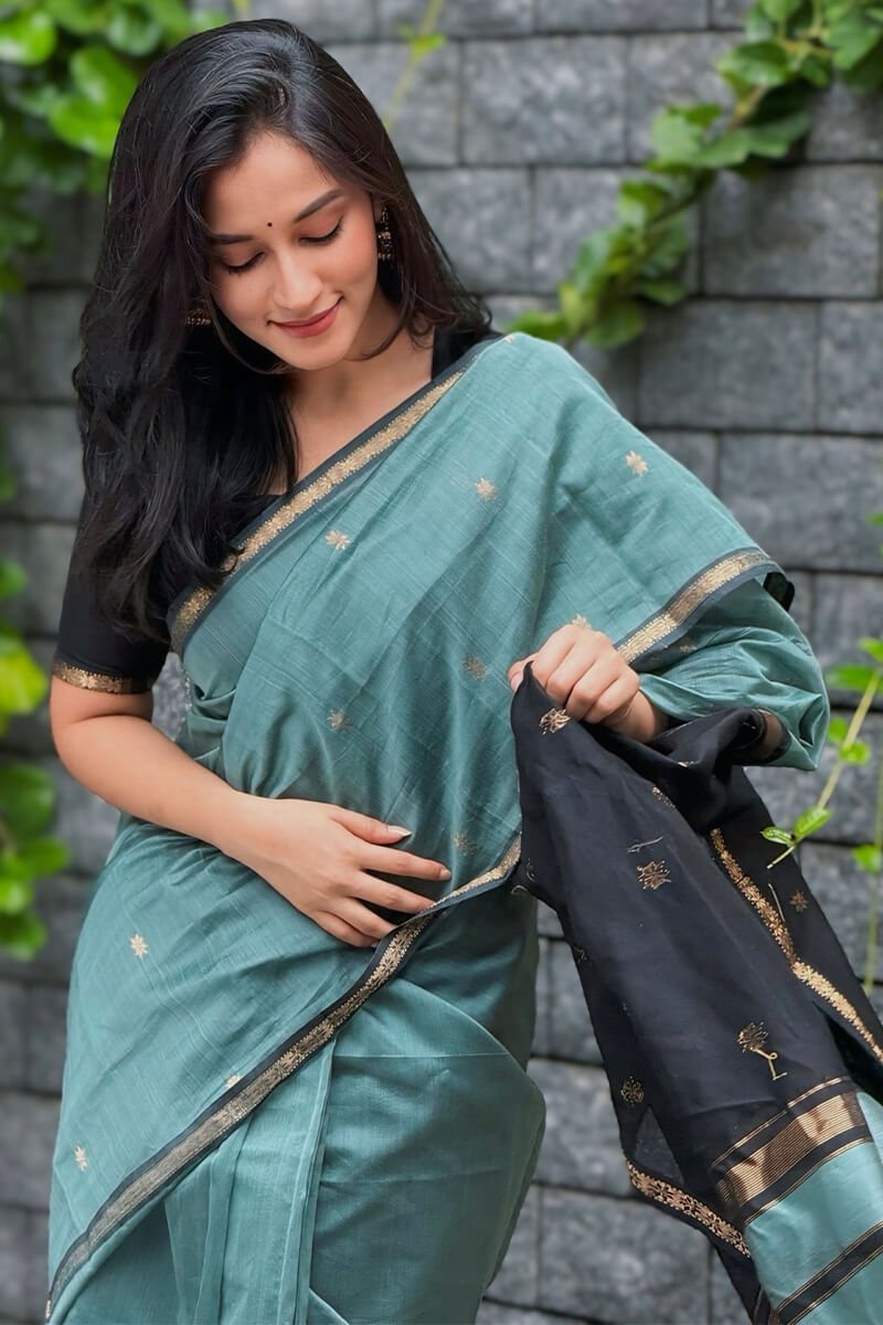 Classy Sea Green Cotton Silk Saree With Gratifying  Blouse Piece