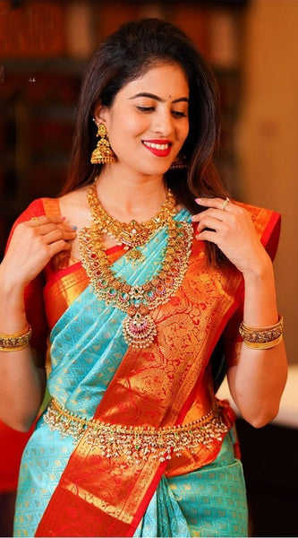 Blissful Turquoise Soft Silk Saree with Ethnic Blouse Piece