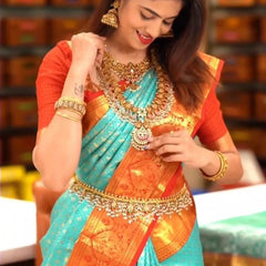 Blissful Turquoise Soft Silk Saree with Ethnic Blouse Piece