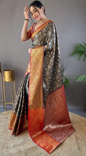 Skinny Black Kanjivaram Silk Saree With Dazzling Blouse Piece