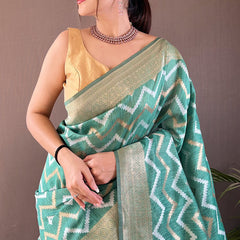 Outstanding Green Cotton Silk Saree With Capricious Blouse Piece