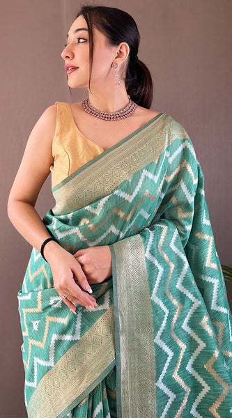 Outstanding Green Cotton Silk Saree With Capricious Blouse Piece