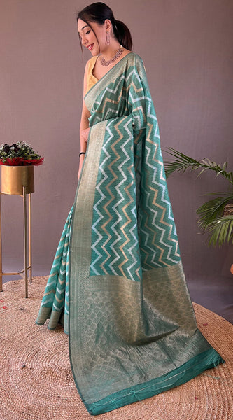 Outstanding Green Cotton Silk Saree With Capricious Blouse Piece