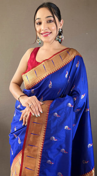 Desultory Royal Blue Paithani Silk Saree With Embrocation Blouse Piece