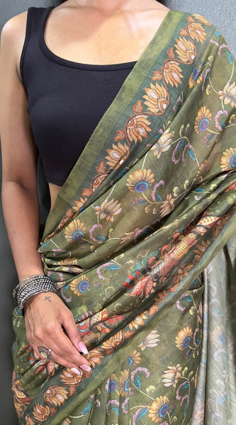 Captivating Green Kalamkari Printed Saree With Prominent Blouse Piece