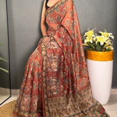 Desirable Orange Kalamkari Printed Saree With Stunner Blouse Piece