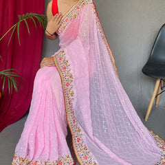 Pleasant Pink Sequence Work Georgette Saree With Engrossing Blouse Piece