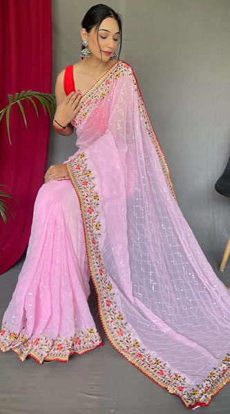 Pleasant Pink Sequence Work Georgette Saree With Engrossing Blouse Piece