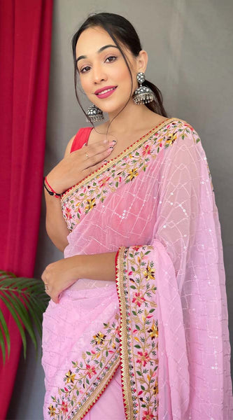 Pleasant Pink Sequence Work Georgette Saree With Engrossing Blouse Piece