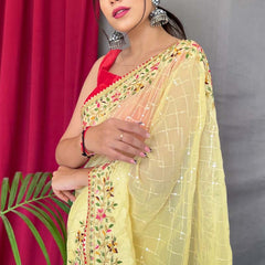 Glowing Yellow Sequence Work Georgette Saree With Prominent Blouse Piece