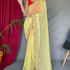 Glowing Yellow Sequence Work Georgette Saree With Prominent Blouse Piece