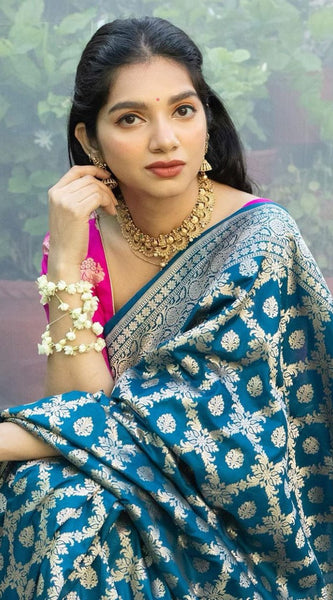 Prodigal Teal Blue Soft Banarasi Silk Saree With Inimitable Blouse Piece