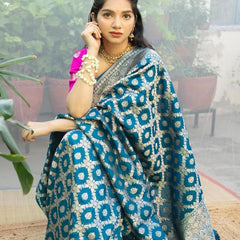 Prodigal Teal Blue Soft Banarasi Silk Saree With Inimitable Blouse Piece