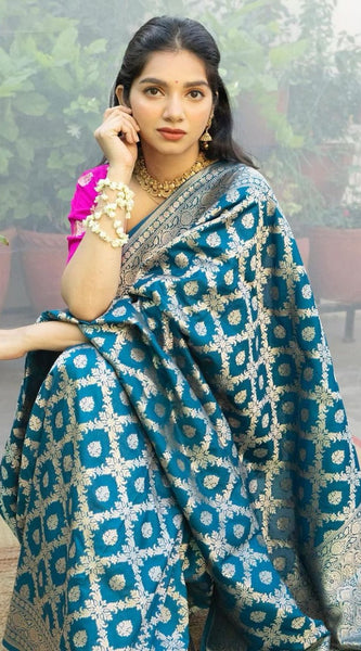 Prodigal Teal Blue Soft Banarasi Silk Saree With Inimitable Blouse Piece