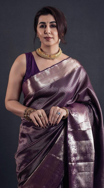 Evanescent Kanjivaram Purple Soft Silk Saree With Brood Blouse Piece