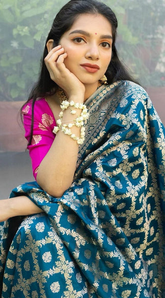 Prodigal Teal Blue Soft Banarasi Silk Saree With Inimitable Blouse Piece